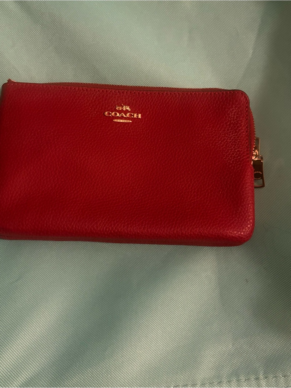#22  Peach Pebble  Leather Zip Wristlet w/Gold Logo creed:D1822-F57465